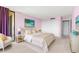 Spacious bedroom with king-size bed and access to balcony at 700 Island Way # 704, Clearwater Beach, FL 33767