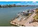 Community deck overlooking the water with seating and tables at 700 Island Way # 704, Clearwater Beach, FL 33767