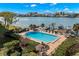 Resort-style pool with lounge chairs and waterfront views at 700 Island Way # 704, Clearwater Beach, FL 33767