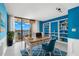 Home office with built-in shelving, wooden desk, and water views at 700 Island Way # 704, Clearwater Beach, FL 33767