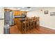 Modern kitchen with stainless steel appliances and breakfast bar at 700 Island Way # 704, Clearwater Beach, FL 33767