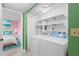 Convenient laundry room with washer and dryer at 700 Island Way # 704, Clearwater Beach, FL 33767