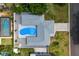 Aerial view showing home with pool and fenced backyard at 701 25Th Sw St, Largo, FL 33770