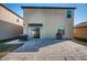 Home features a large backyard with patio and fenced area at 7014 King Creek Dr, Sun City Center, FL 33573