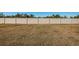 Large backyard with grassy area and privacy fence at 7014 King Creek Dr, Sun City Center, FL 33573