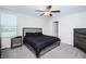 Large bedroom with ceiling fan and dresser at 7014 King Creek Dr, Sun City Center, FL 33573