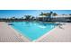 Community pool area with a large deck at 7014 King Creek Dr, Sun City Center, FL 33573
