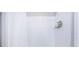 Clean shower with white tile and storage shelf at 7014 King Creek Dr, Sun City Center, FL 33573