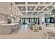 Open concept kitchen with island, stainless steel appliances, and white cabinets at 9152 Warm Springs Cir, Parrish, FL 34219