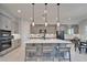 Spacious kitchen island with seating and breakfast bar at 9152 Warm Springs Cir, Parrish, FL 34219
