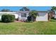 Private backyard with a patio, providing a serene outdoor setting at 9156 142Nd St, Seminole, FL 33776