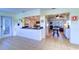 Open concept kitchen with breakfast bar and tile floor at 9156 142Nd St, Seminole, FL 33776