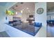 Modern kitchen with granite breakfast bar and stainless steel appliances at 9156 142Nd St, Seminole, FL 33776