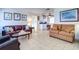 Spacious living room with tiled floors and comfortable seating at 9156 142Nd St, Seminole, FL 33776
