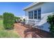 Brick patio with wrought iron furniture, offering a relaxing outdoor space at 9156 142Nd St, Seminole, FL 33776