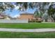 Two story house with pool and fenced backyard at 9341 Wellington Park Cir, Tampa, FL 33647