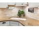 Kitchen detail shows granite countertops and a corner sink at 1049 S Pointe Alexis Dr, Tarpon Springs, FL 34689