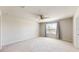 Bright bedroom featuring neutral walls and carpet at 10827 High Noon Trl, Parrish, FL 34219