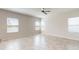 Bright and airy common area with tile flooring and natural light at 10827 High Noon Trl, Parrish, FL 34219