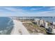 Aerial view showing beachfront property, ocean, beach, and high-rise buildings at 1230 Gulf Blvd # 604, Clearwater Beach, FL 33767