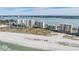 Aerial view of beachfront high-rise buildings and beach at 1230 Gulf Blvd # 604, Clearwater Beach, FL 33767