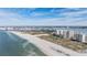 Aerial view of beachfront property with ocean, beach, and high rise buildings at 1230 Gulf Blvd # 604, Clearwater Beach, FL 33767