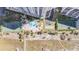 Overhead view of resort amenities including pool, tennis courts, and green space at 1230 Gulf Blvd # 604, Clearwater Beach, FL 33767