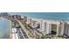 Aerial view of beachfront high-rise building and surrounding area at 1230 Gulf Blvd # 604, Clearwater Beach, FL 33767