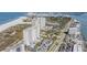 Aerial view of beachfront high-rise building with ocean and beach views at 1230 Gulf Blvd # 604, Clearwater Beach, FL 33767