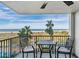 Balcony with ocean, pool, and tennis court view at 1230 Gulf Blvd # 604, Clearwater Beach, FL 33767