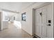 Clean hallway with white walls and doors to condo unit at 1230 Gulf Blvd # 604, Clearwater Beach, FL 33767