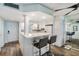 White kitchen with breakfast bar and ocean view at 1230 Gulf Blvd # 604, Clearwater Beach, FL 33767