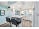 White kitchen with breakfast bar and ocean view at 1230 Gulf Blvd # 604, Clearwater Beach, FL 33767