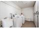 Shared laundry facility with several washers and dryers at 1230 Gulf Blvd # 604, Clearwater Beach, FL 33767