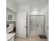 Modern bathroom with a large walk-in shower and tiled flooring at 12626 Tahitian Pearl Cir, Parrish, FL 34219