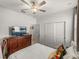 Comfortable bedroom with double doors and lots of natural light at 12626 Tahitian Pearl Cir, Parrish, FL 34219