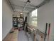 Garage with storage shelving, workbench, and additional space at 12626 Tahitian Pearl Cir, Parrish, FL 34219