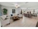 Open concept living area with kitchen, dining, and living room at 12626 Tahitian Pearl Cir, Parrish, FL 34219