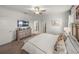 Bright main bedroom with king-size bed and plenty of natural light at 12626 Tahitian Pearl Cir, Parrish, FL 34219
