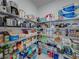 Large walk-in pantry stocked with shelves and various food items at 12626 Tahitian Pearl Cir, Parrish, FL 34219