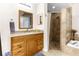 Bathroom with walk-in shower, soaking tub, and granite countertops at 12801 Big Sur Dr, Tampa, FL 33625