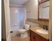 Bathroom with granite vanity and tub shower combo at 12908 Brant Tree Dr, Riverview, FL 33579