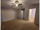 Bright bedroom with sliding glass doors and access to bathroom at 12908 Brant Tree Dr, Riverview, FL 33579