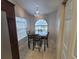 Cozy dining area with a large window, ideal for enjoying meals with natural light and nice views at 12908 Brant Tree Dr, Riverview, FL 33579