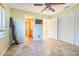 Bright bedroom with tile floors and ample closet space at 131 Mystic Lake N Dr, St Petersburg, FL 33702