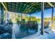 Relaxing covered patio overlooking tranquil lake at 131 Mystic Lake N Dr, St Petersburg, FL 33702