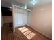Bedroom featuring wood floors, and open closet space at 1319 Vance Rd, Plant City, FL 33566