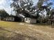 Two small houses on a large lot with mature trees at 1319 Vance Rd, Plant City, FL 33566