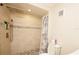 Updated bathroom featuring a walk-in shower with pebble flooring and decorative tile accents at 1330 70Th N St, St Petersburg, FL 33710