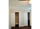 This bedroom has lots of storage space with two closets featuring bi-fold doors at 1330 70Th N St, St Petersburg, FL 33710